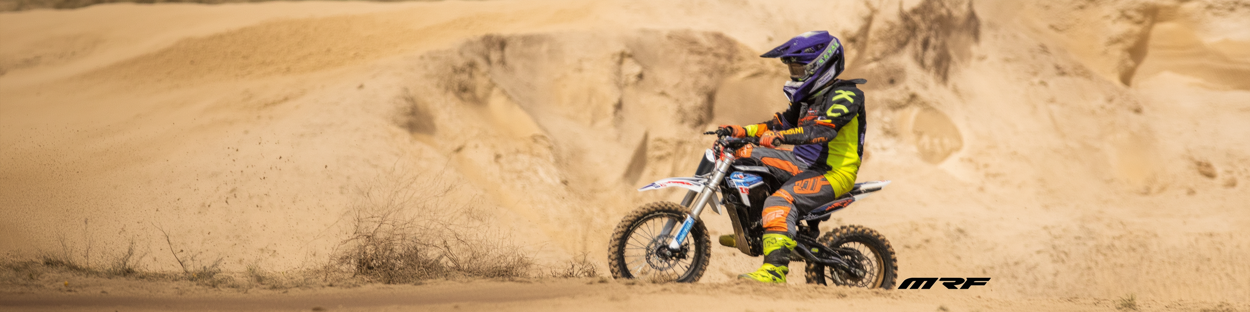 sebastian1_a_motocross_rider_in_the_air_wearing_black_and_blue__ce7cc734-1616-4680-b0c1-4b122d8dfa4e